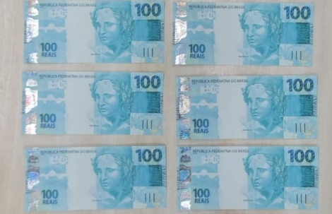 Notas falsas de R$ 100 foram apreendidas pela PF.  Foto: Foto: divulgao/PF.